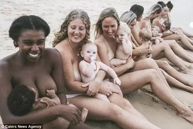 Stunning photos capture the deep bond between mother and child through breastfeeding moments on the beach, celebrating resilience and postpartum love.